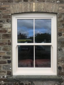 Cream sliding sash window